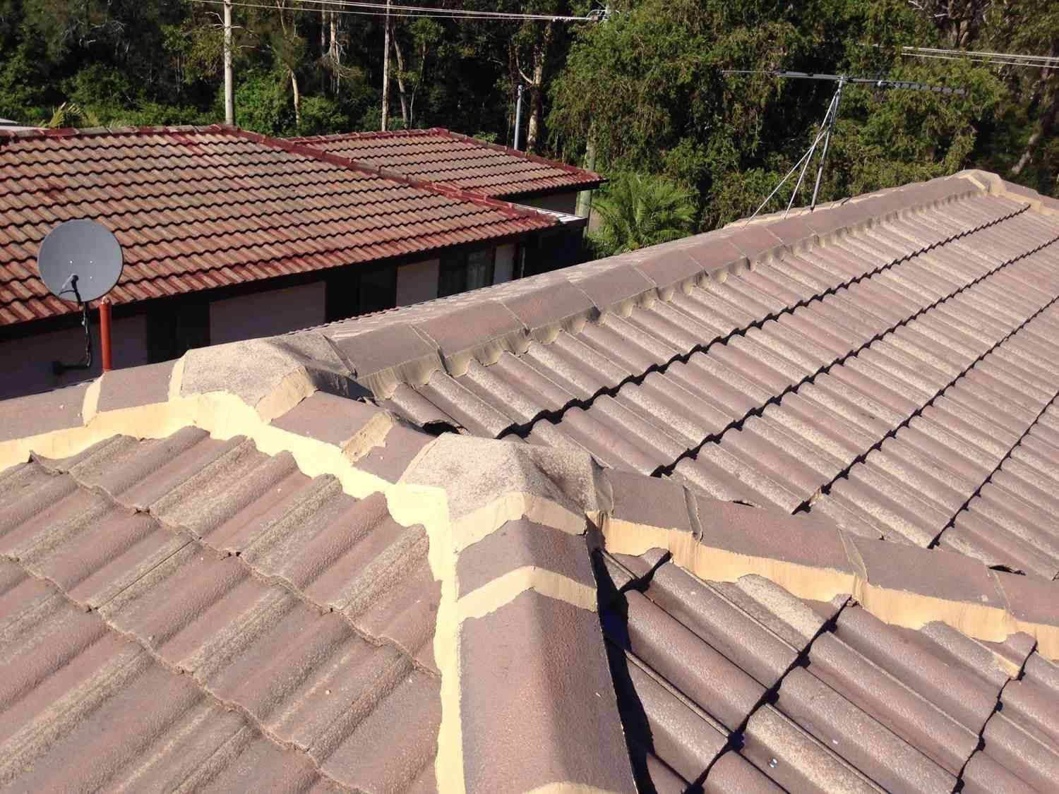 A Roof With A Satellite Dish On Top Of It — In-Time Roofing In Newcastle, NSW