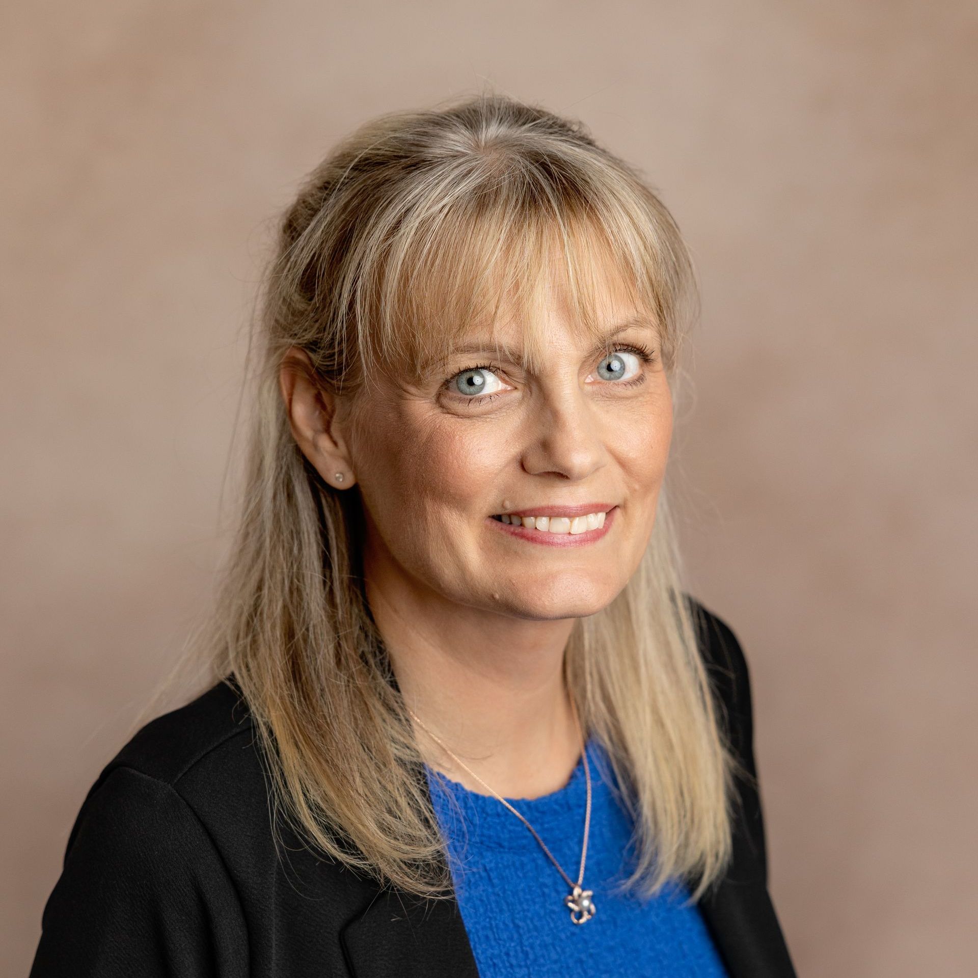 picture of Sarah Schmidt licensed insurance agency owner happy