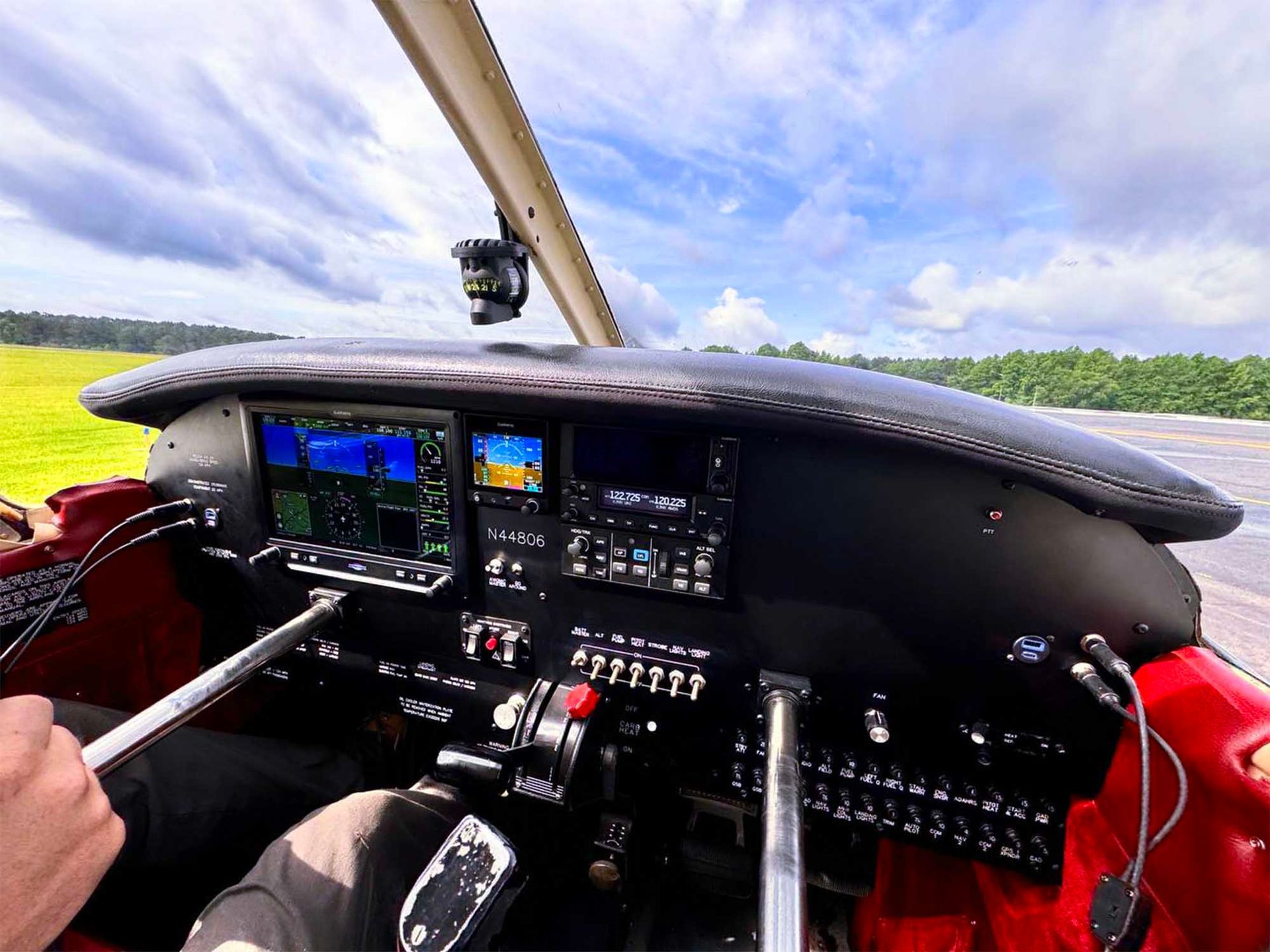Cockpit view showing glass avionics during a training flight.