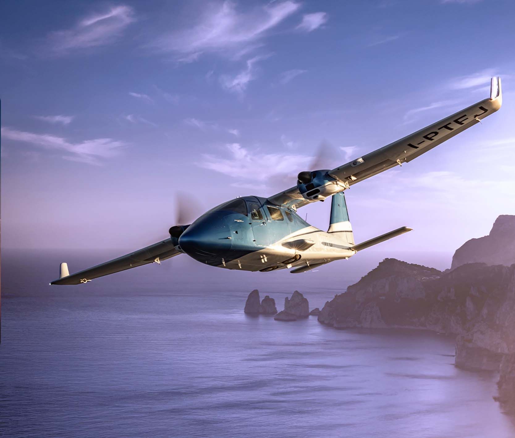 Tecnam P2006T twin-engine aircraft flying at sunrise.