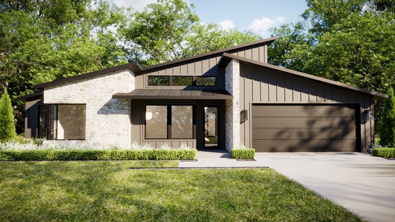 Modern home exterior with stone, dark siding, and sloped roof, set in a green yard with trees.