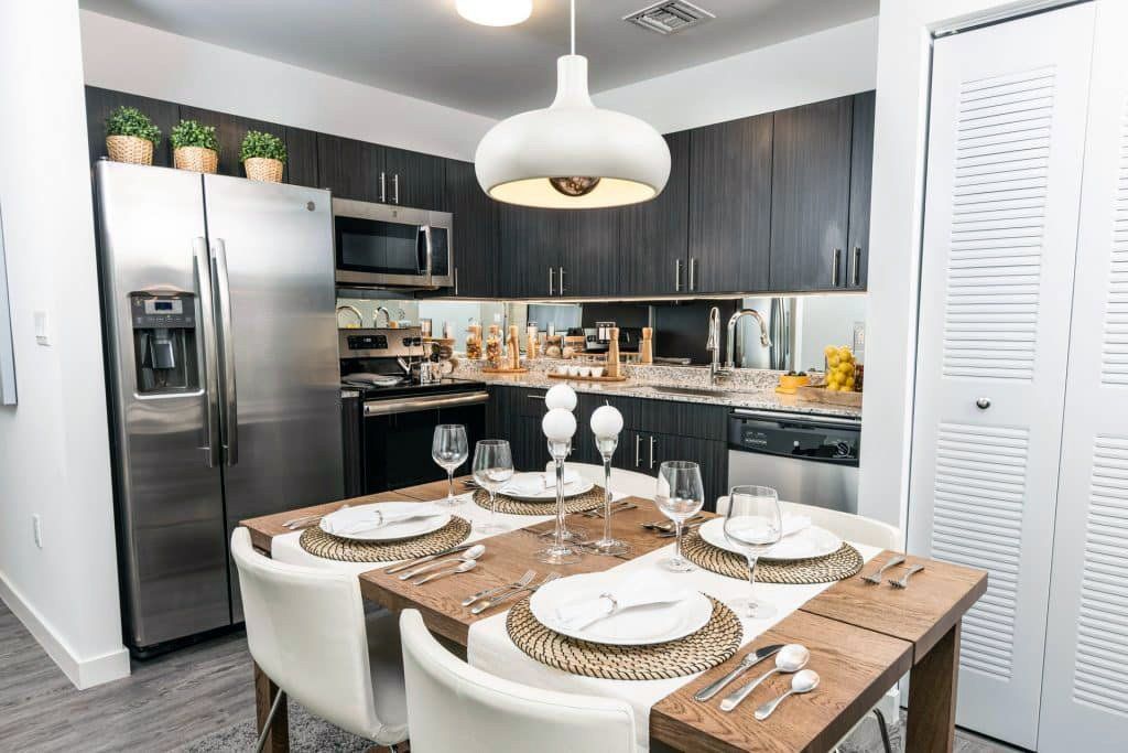Kitchen and dining area at Sophia Square Apartments in Homestead, FL.