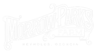 A white logo for a farm in georgia on a white background.