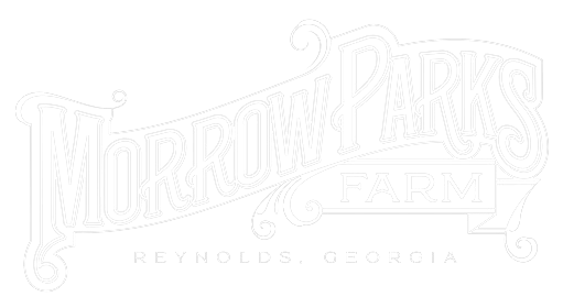 A white logo for a farm in georgia on a white background.