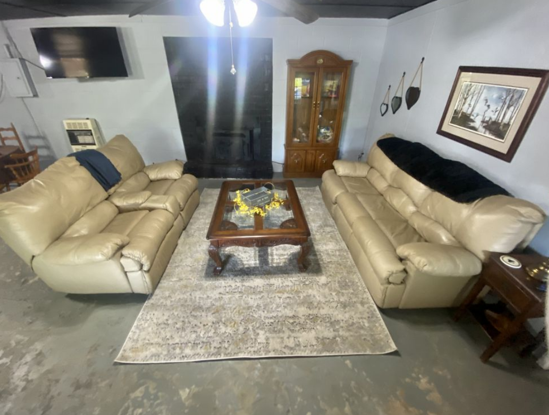 A living room with two couches and a coffee table.