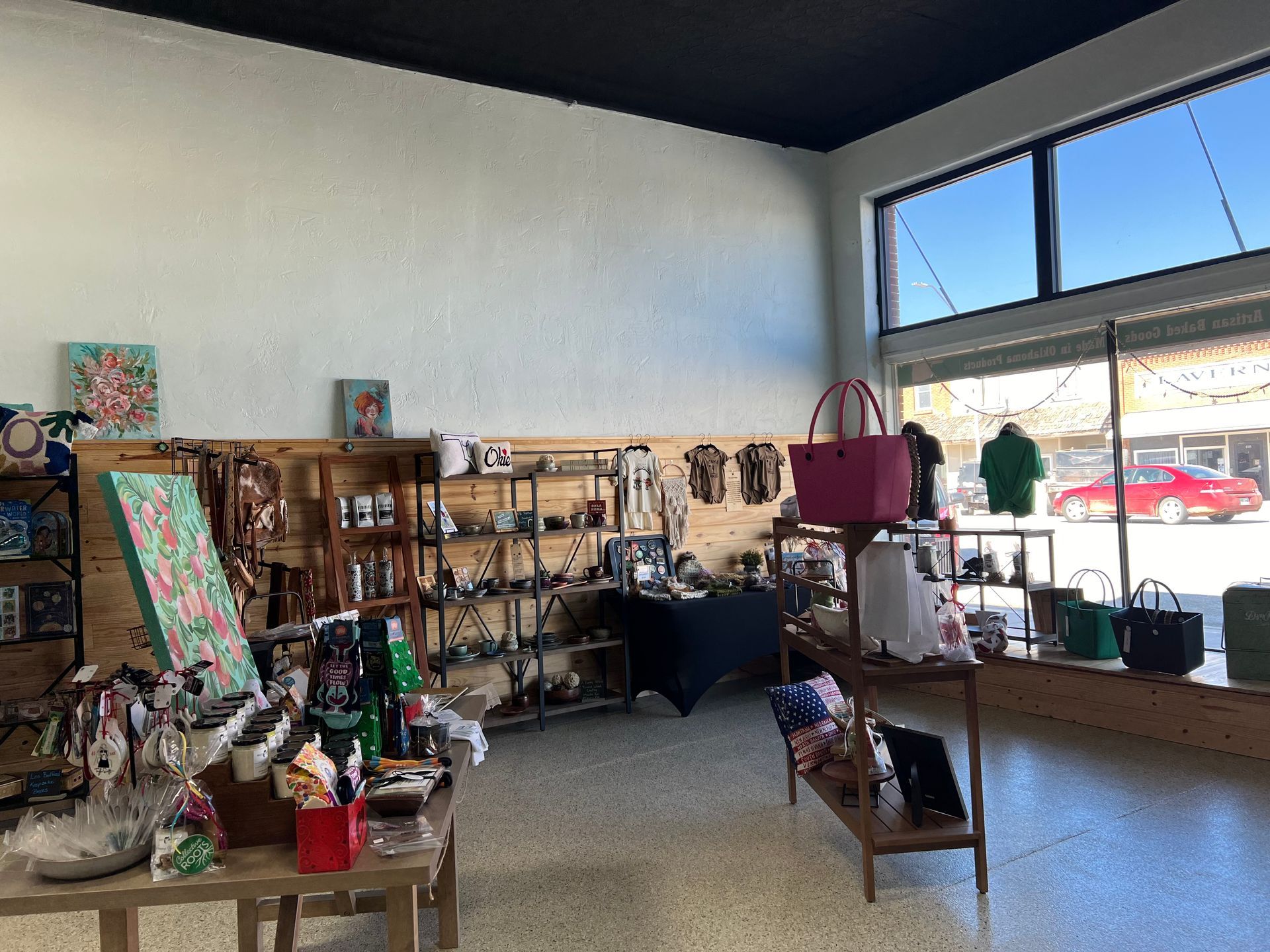 A store filled with lots of items and tables.