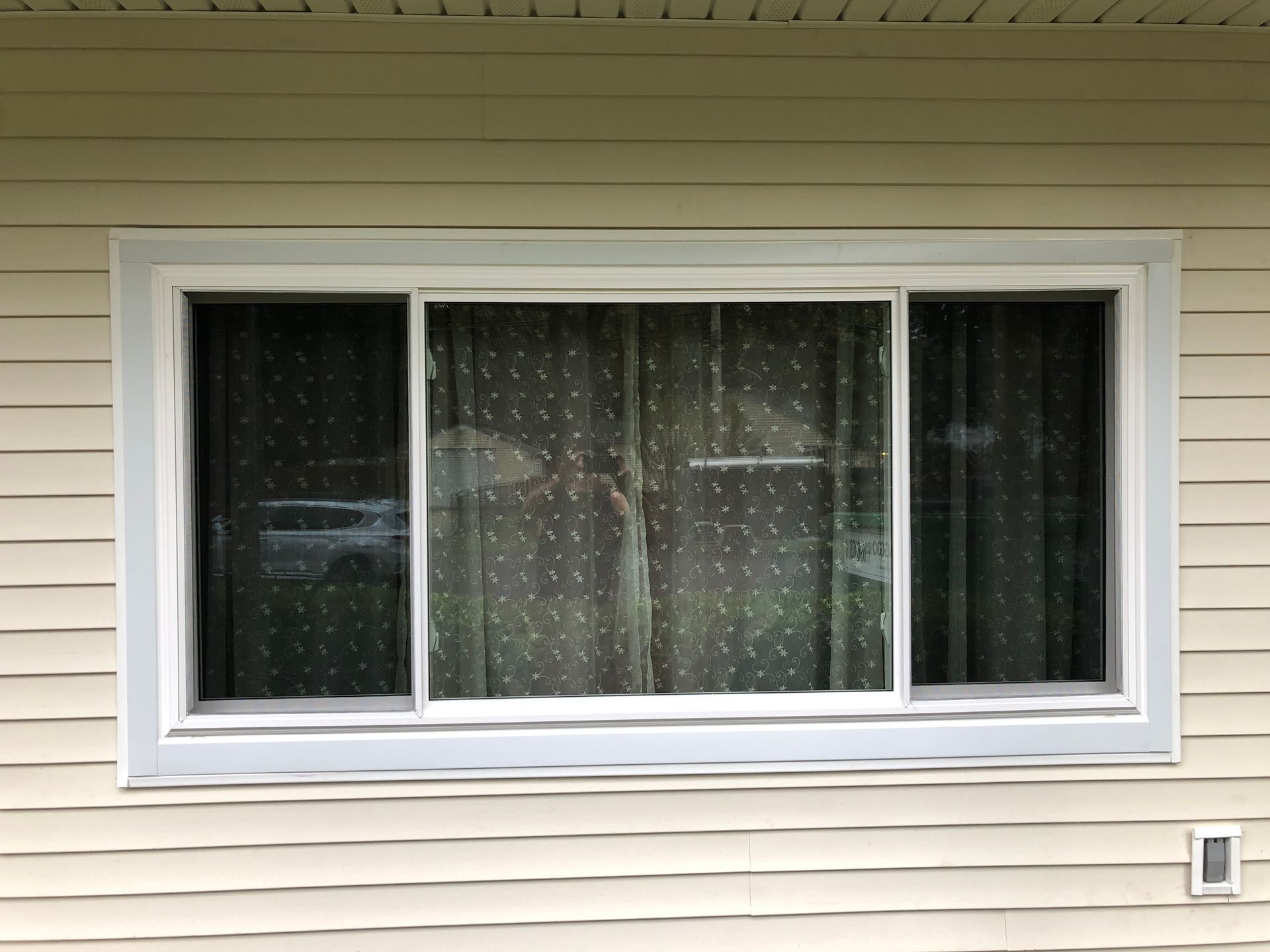 A large window on the side of a house
