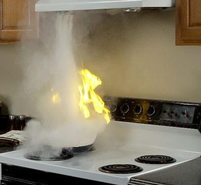 A stove top with smoke coming out of it