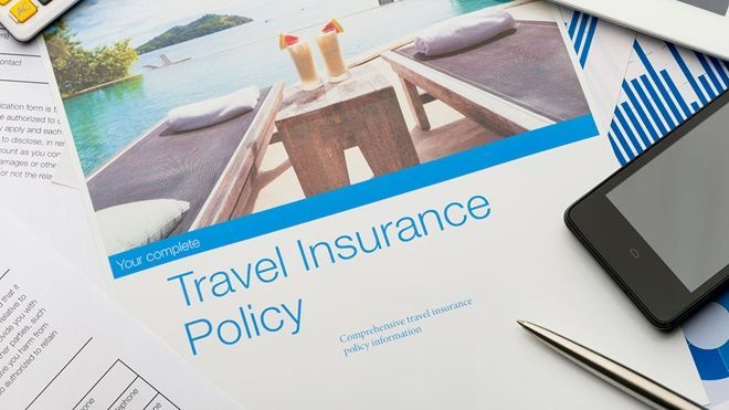 A travel insurance policy is sitting on top of a table.