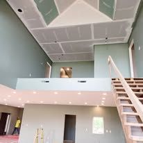 There is a staircase leading up to the second floor of the house.