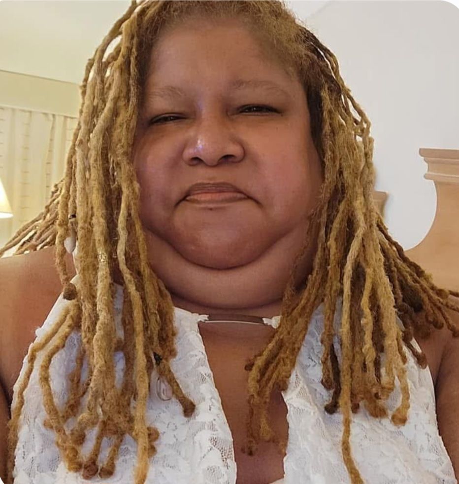 An aerial view of a small island in the middle of the ocean.