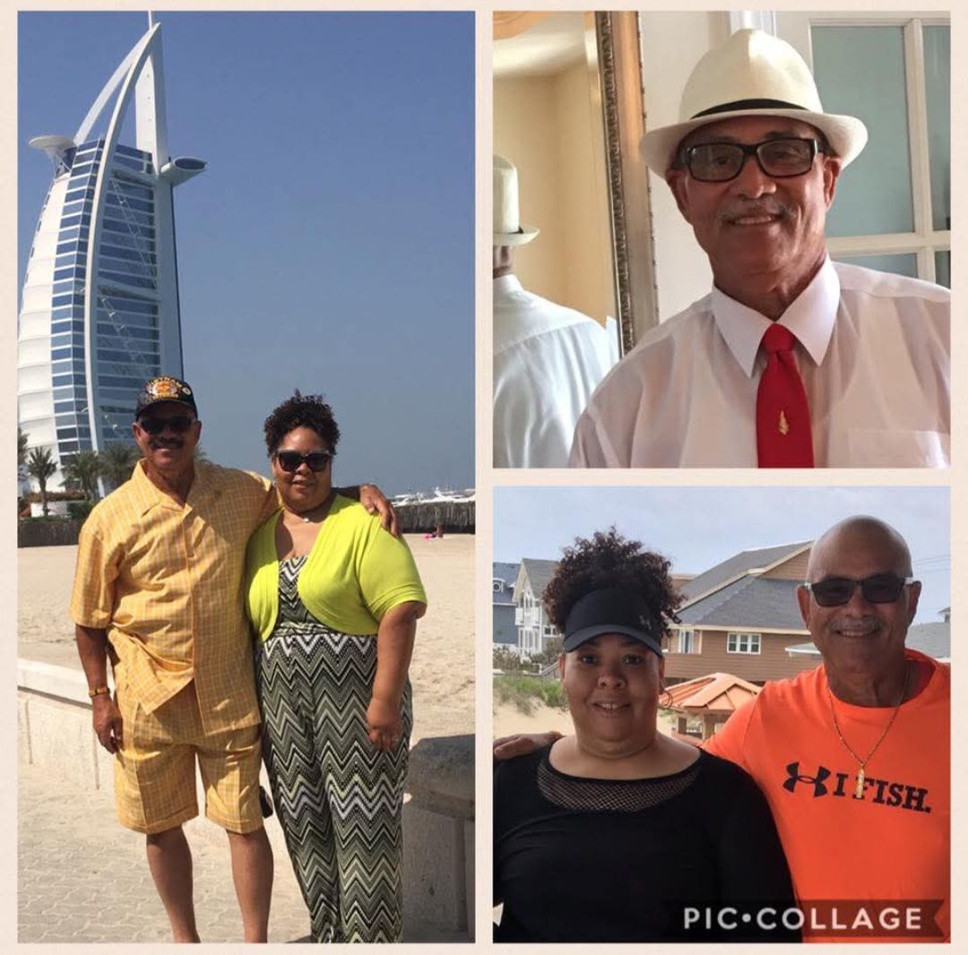A man wearing an under armour shirt poses with a woman