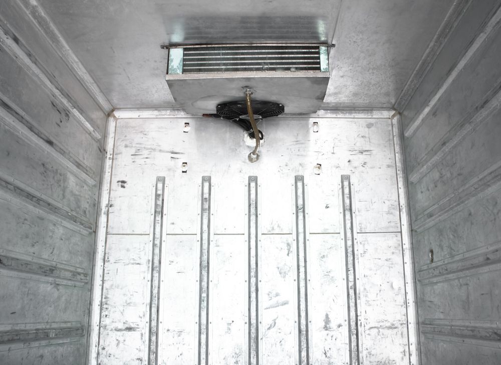 The Inside Of A Truck With A Refrigerator In It — East Coast Air In Newcastle, NSW