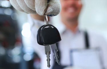 technician-proving-new-set-of-car-keys