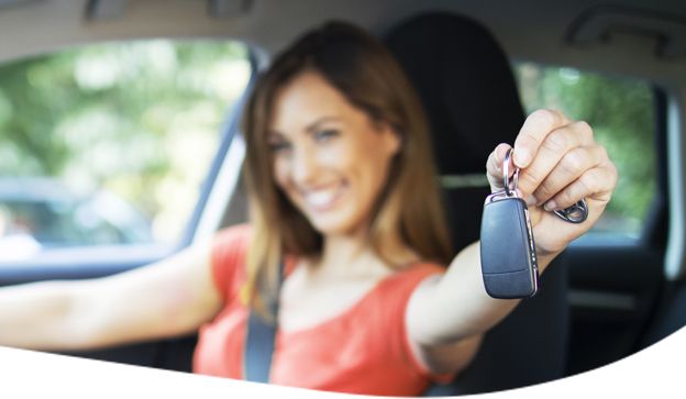 happy-women-holding-car-key