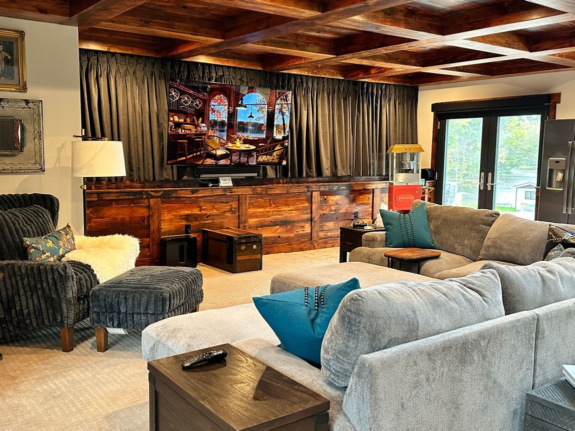 A living room filled with furniture and a flat screen tv.