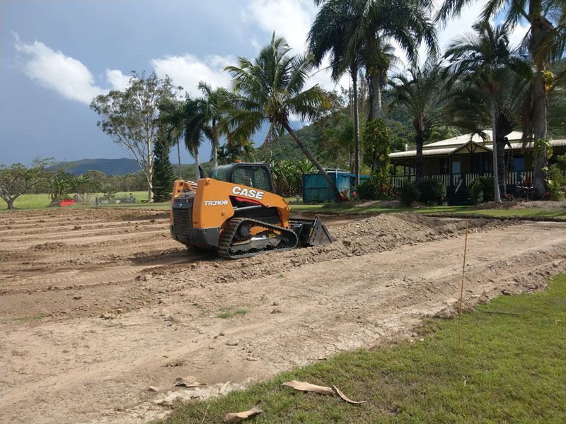 Yellow excavator during digging — Excavation in Alligator Creek, QLD