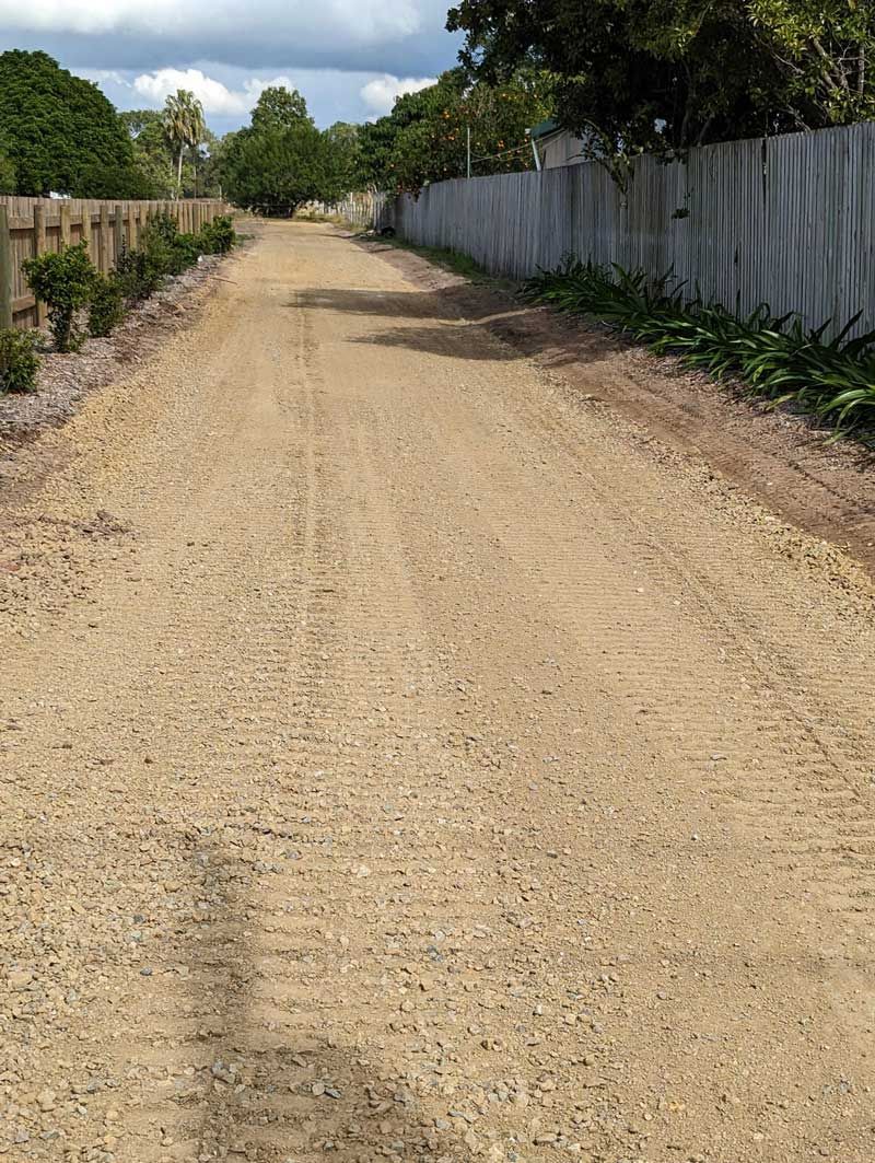 Excavated land and white fence — Excavation in Alligator Creek, QLD