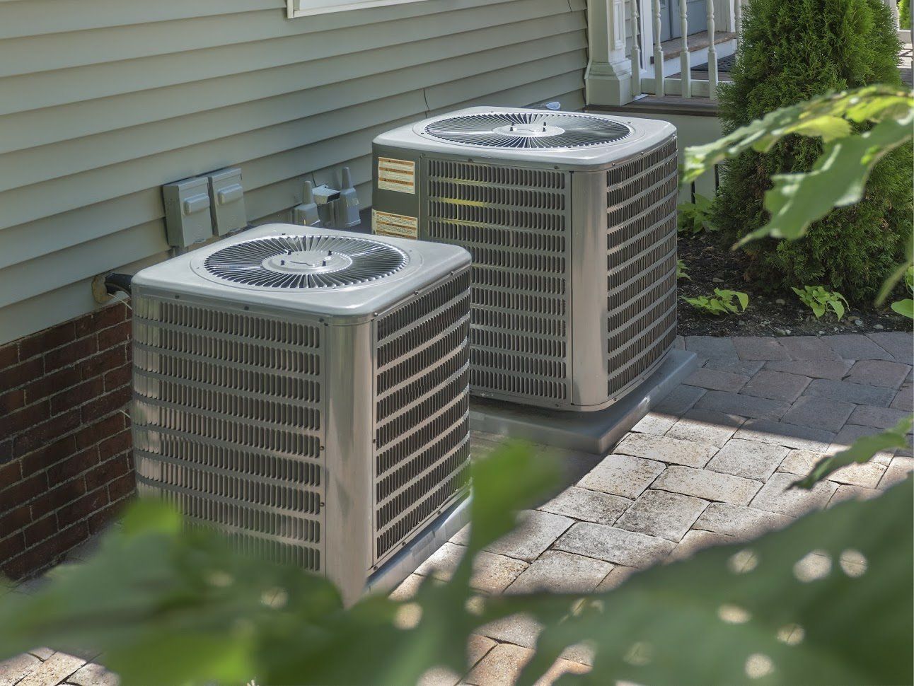  Two HVAC Units Outside The House — Euless, TX — Henry's Service All