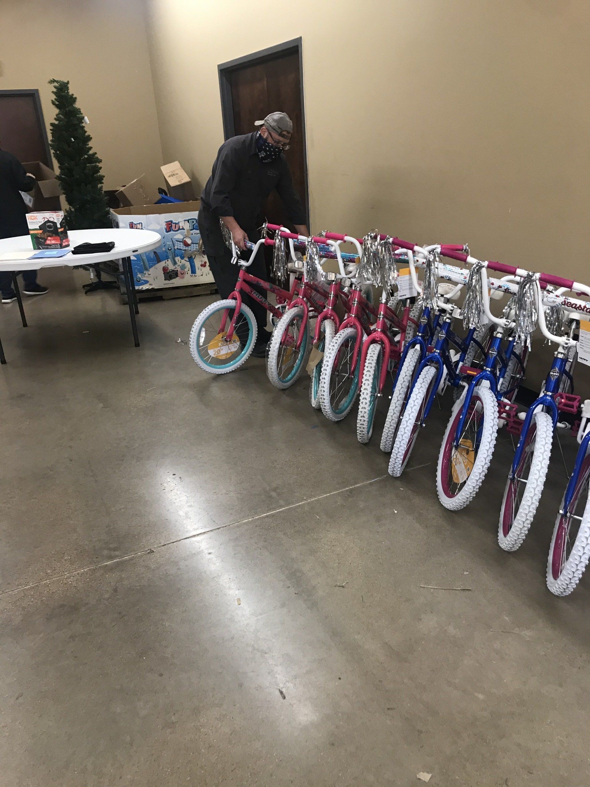 Family involved in giving bikes — Euless, TX - Henry's Service All