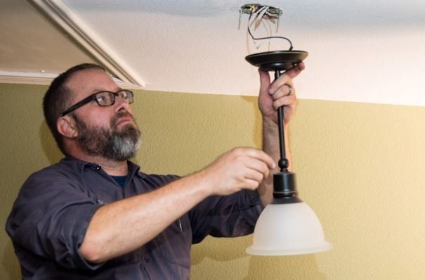 Fixing Ceiling Light — Irving, TX — Henry's Service All
