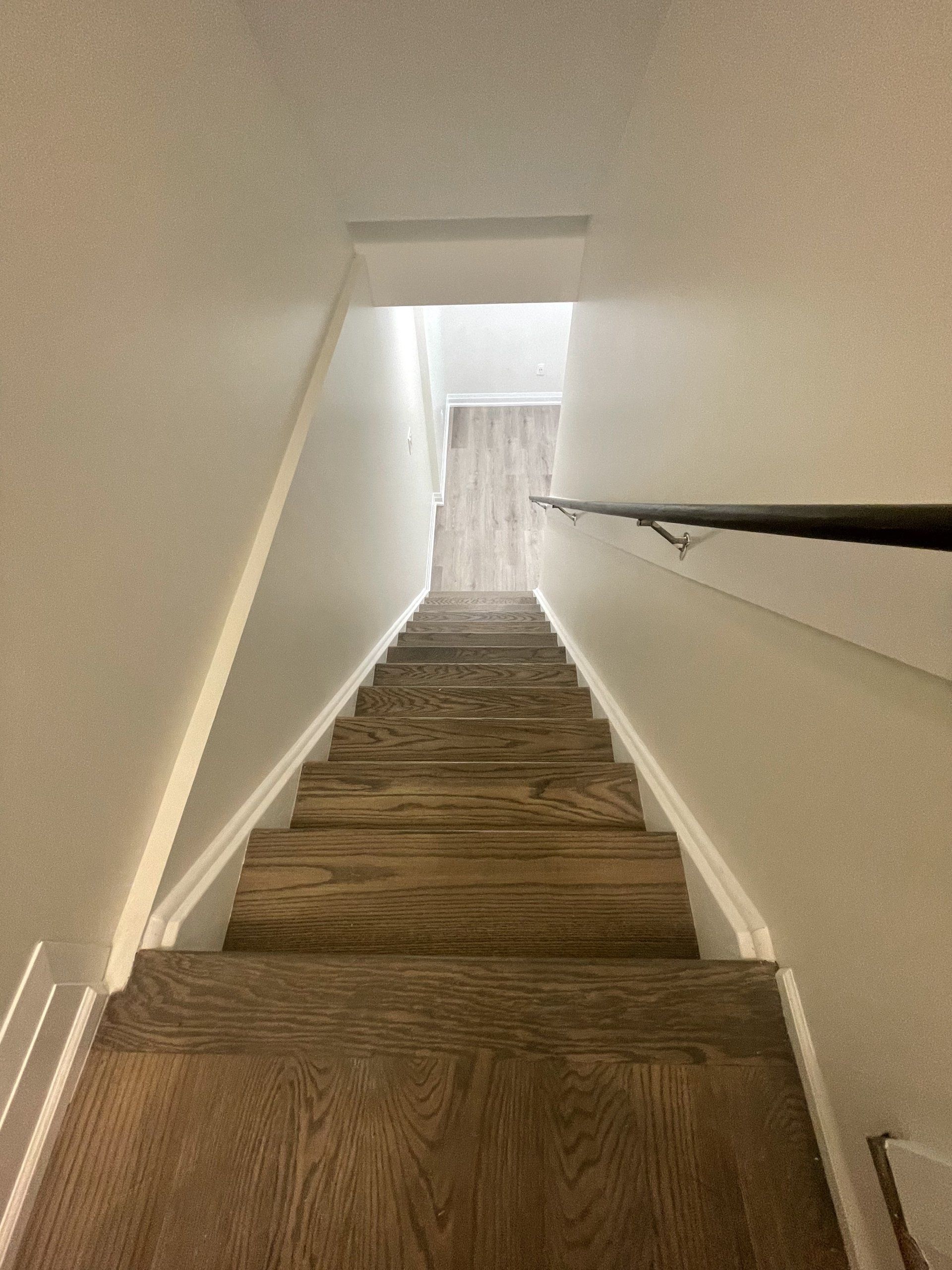 wooden stairs to basement