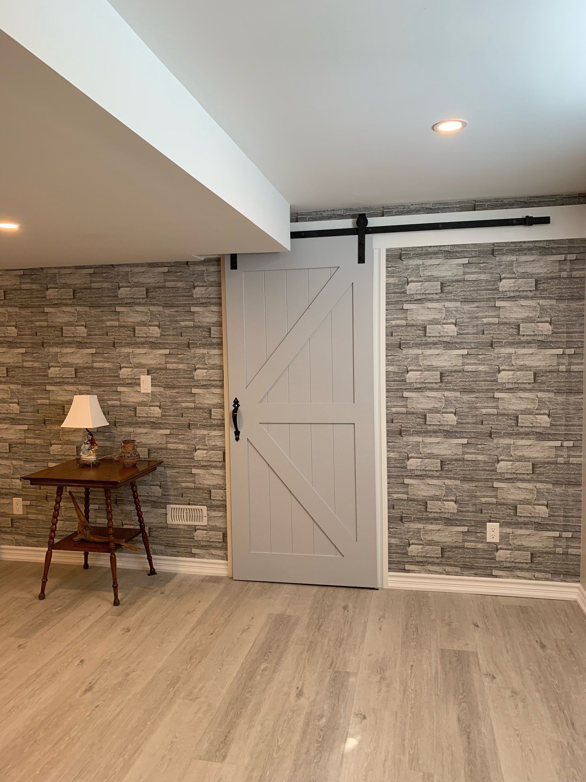 Track roller basement door