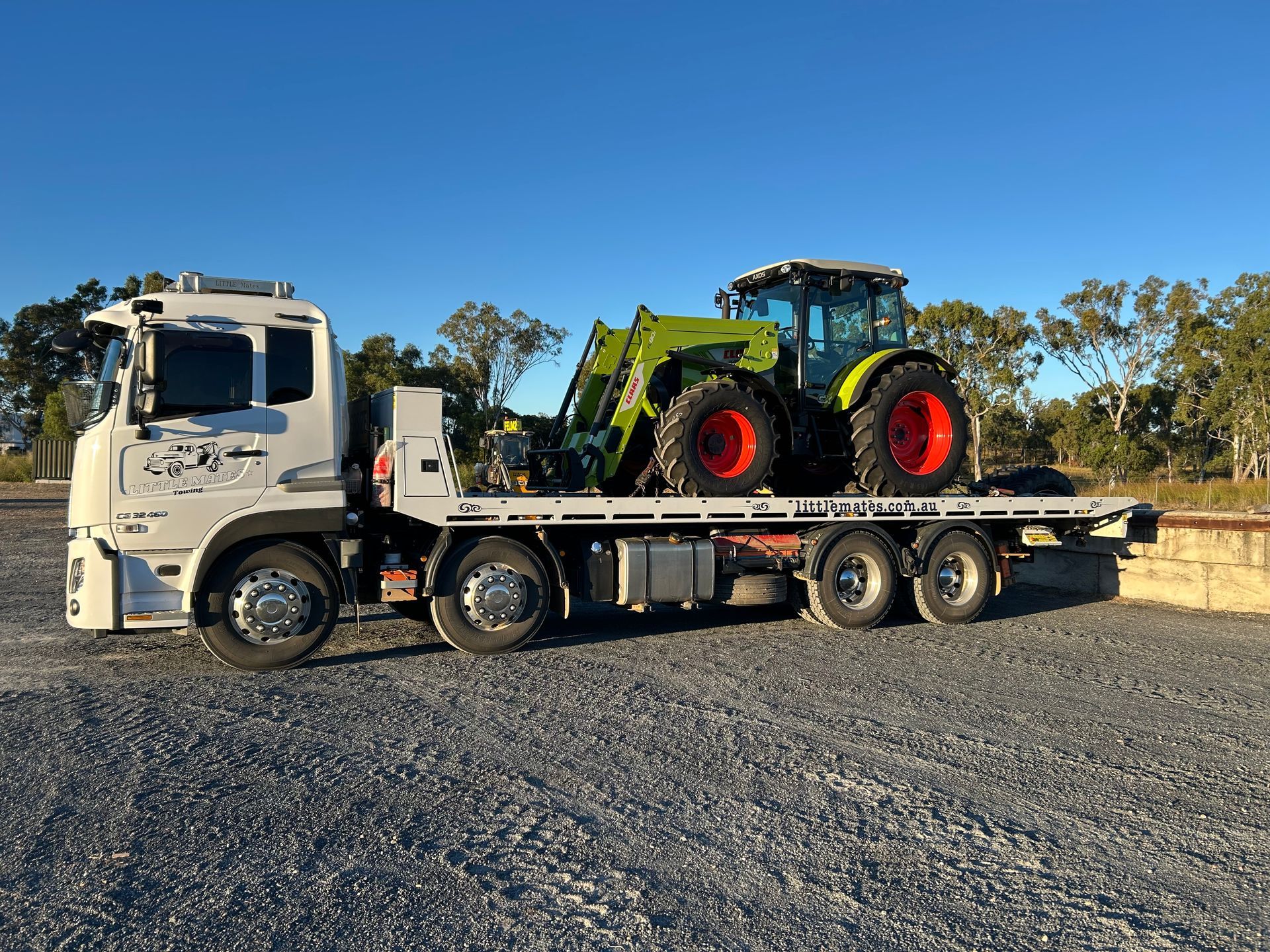 A Car Is Being Towed By A Tow Truck — Little Mates Towing & Transport Pty Ltd In Glenlee, QLD