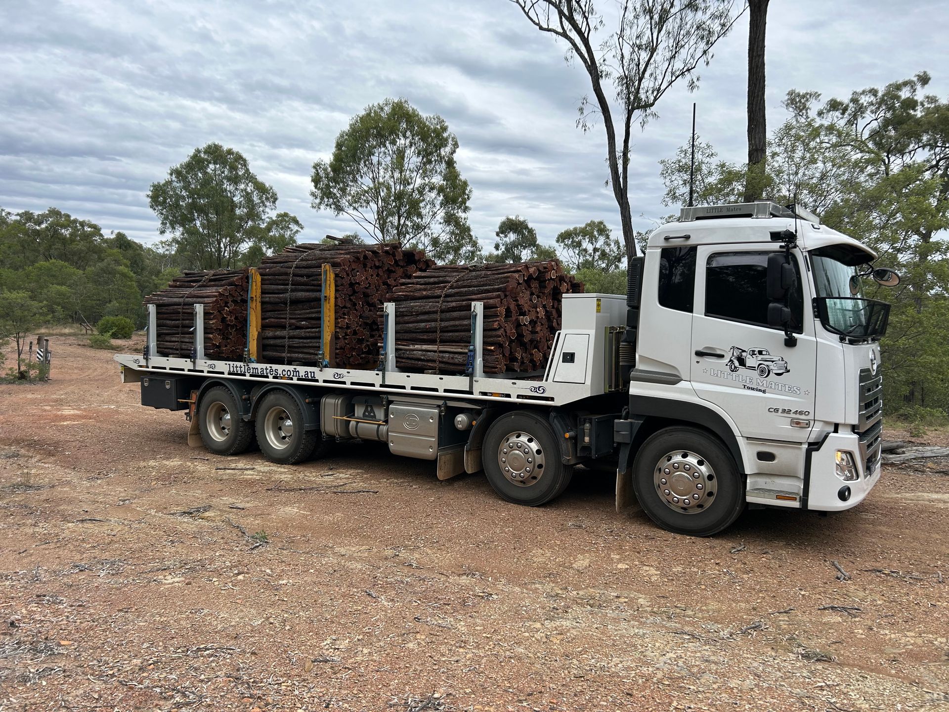 A Tow Truck Is Towing A Damaged Van On A Ramp — Little Mates Towing & Transport Pty Ltd In Yeppoon, QLD