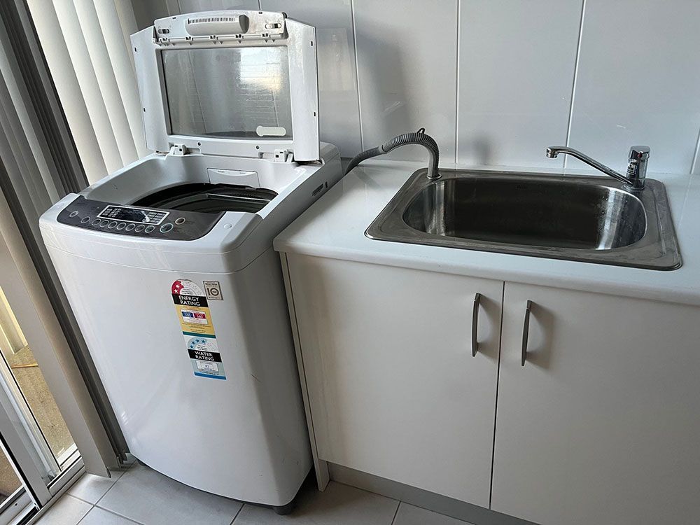 Washing Machine Beside Sink - Appliance Repairs in Taree, NSW