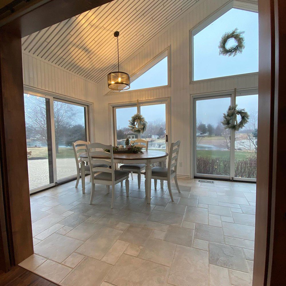 Dining Area With Glass Walls — Forrest, IL — Finishing Touch