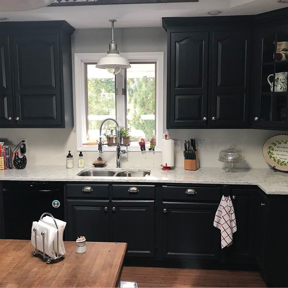 Kitchen With Black Cabinets — Forrest, IL — Finishing Touch