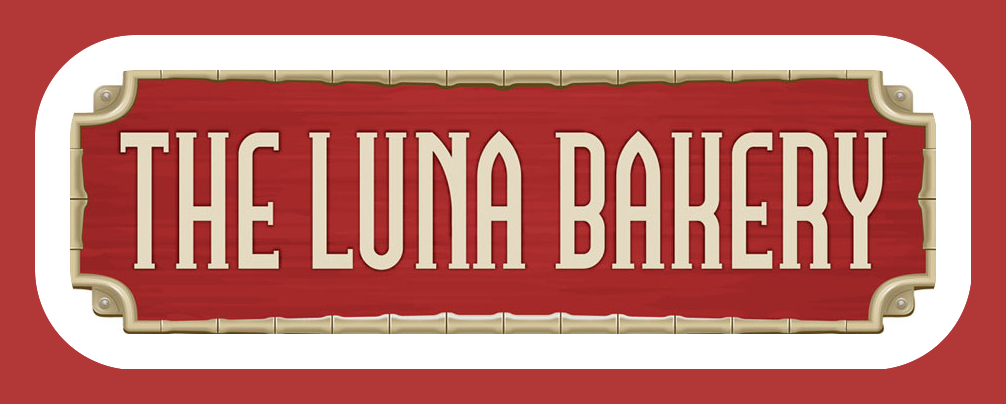 A red sign that says the luna bakery on it