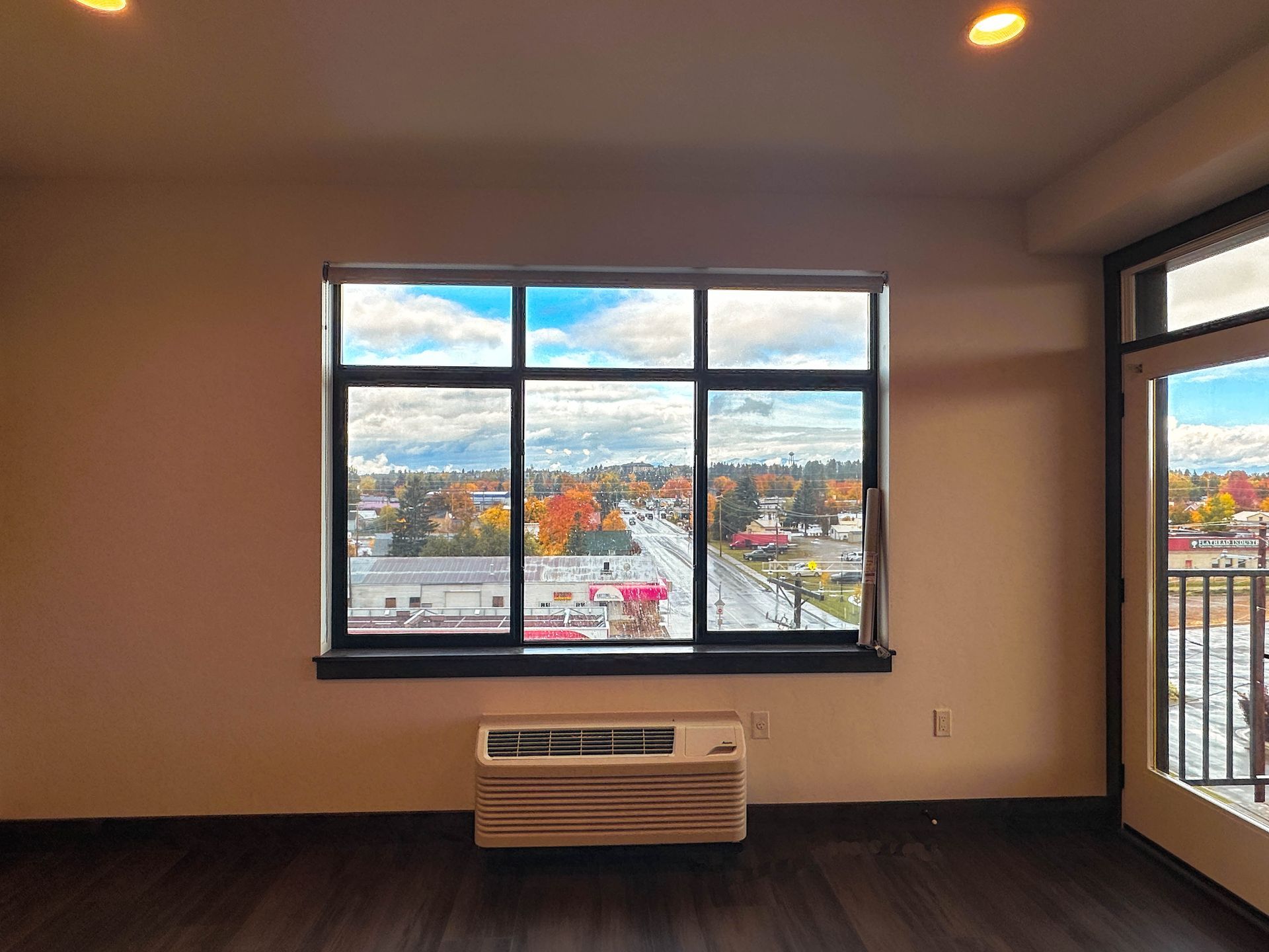 a large window with a view of a city