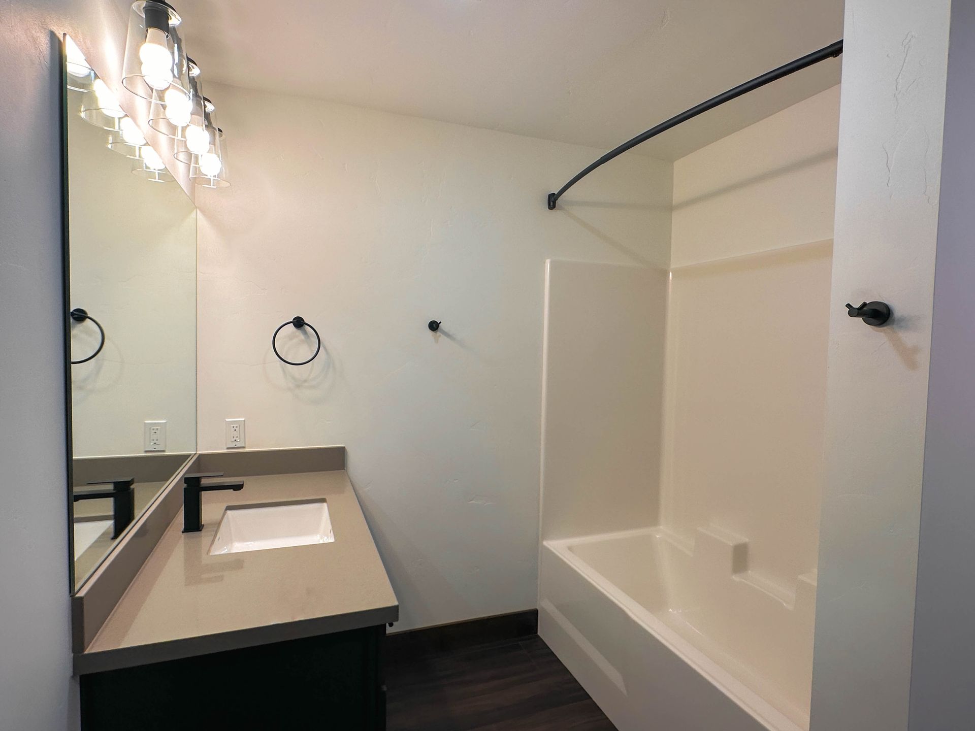 a bathroom with a sink and a bathtub