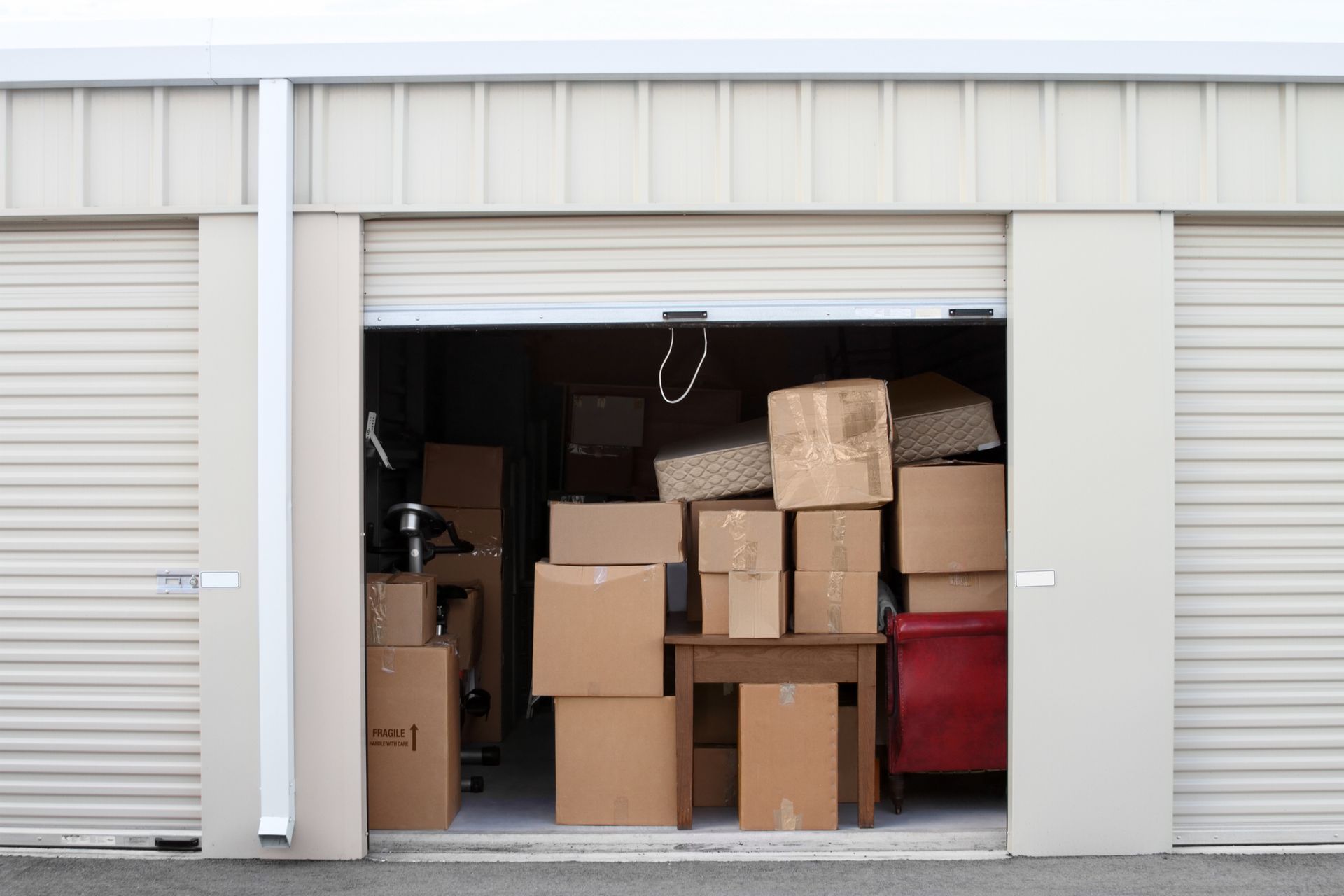 Warehouse building with self storage units. Self storage facility. Roll up doors on self storage facility