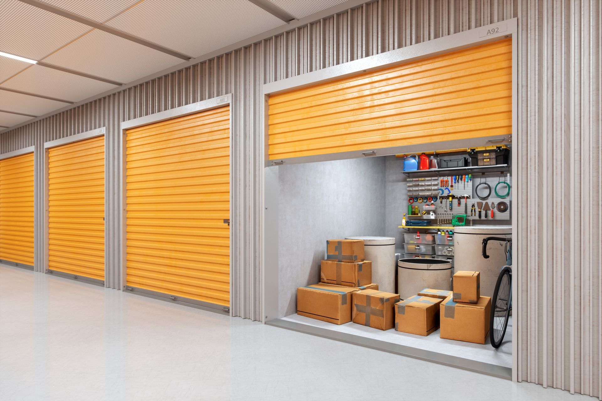 An organized self-storage facility featuring orange storage doors.