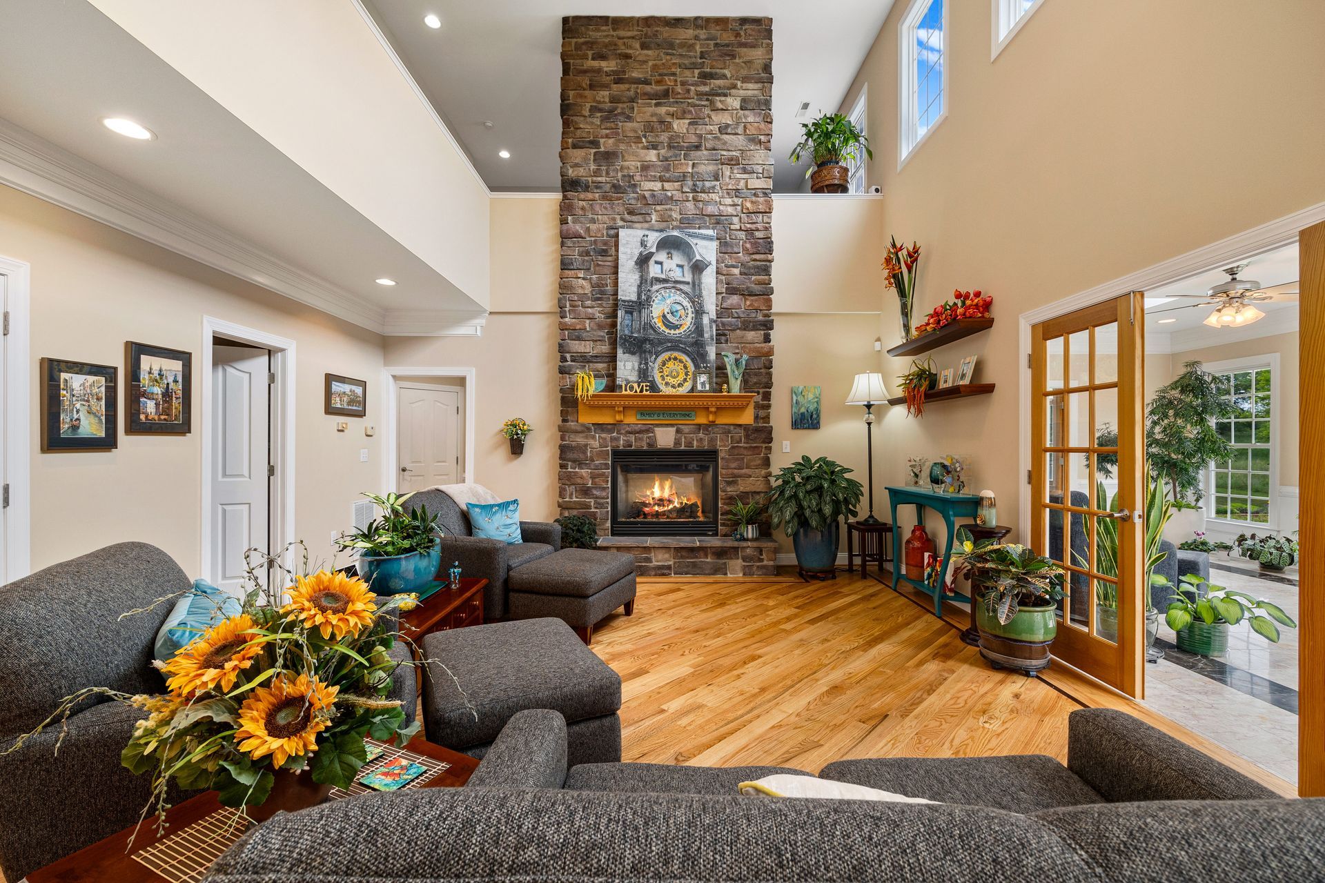 A living room filled with furniture and a fireplace.