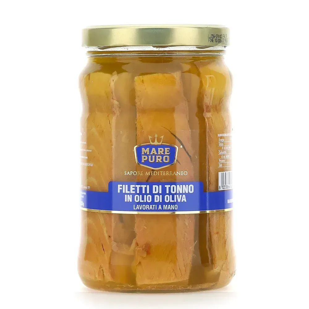 A jar of filetti di tonno in olio di oliva on a white background.