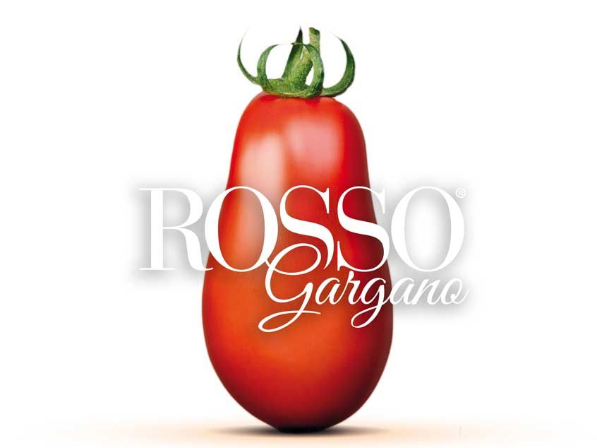 Un pomodoro con la parola rosso sopra