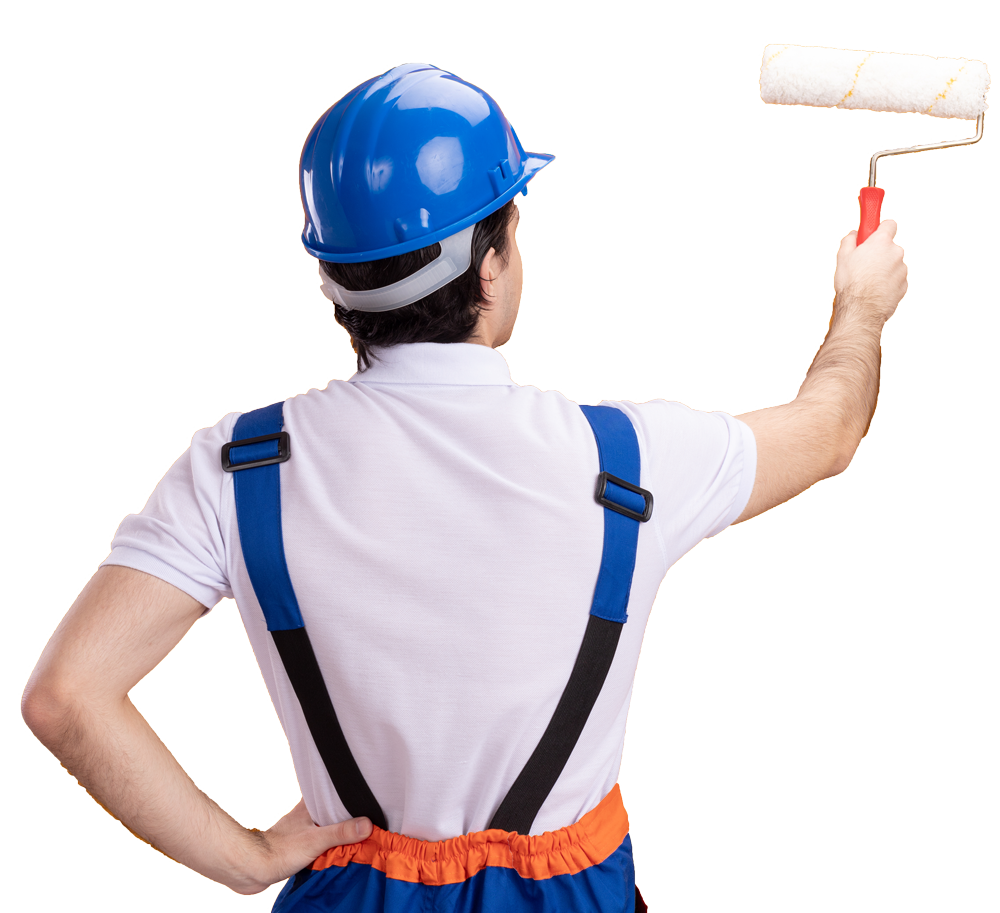 Painter in blue hard hat and overalls using a paint roller.
