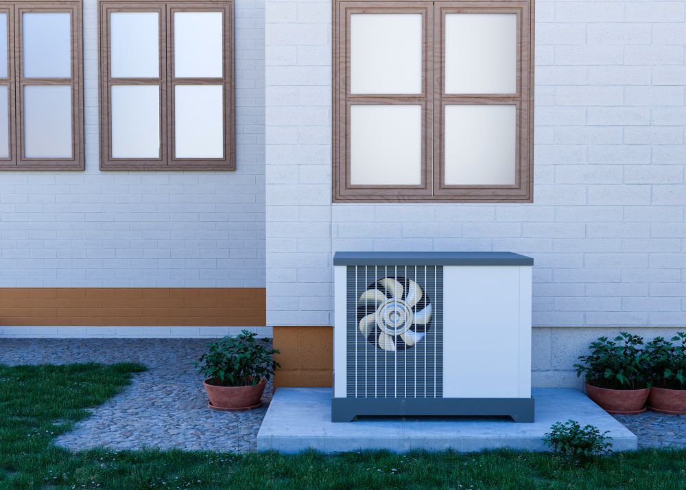 a white house with a heat pump 