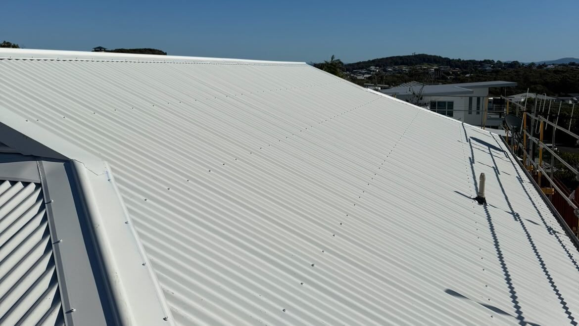 White Corrugated Metal Roof on a Sunny Day — Ace1 Metal Roofing in Taree, NSW