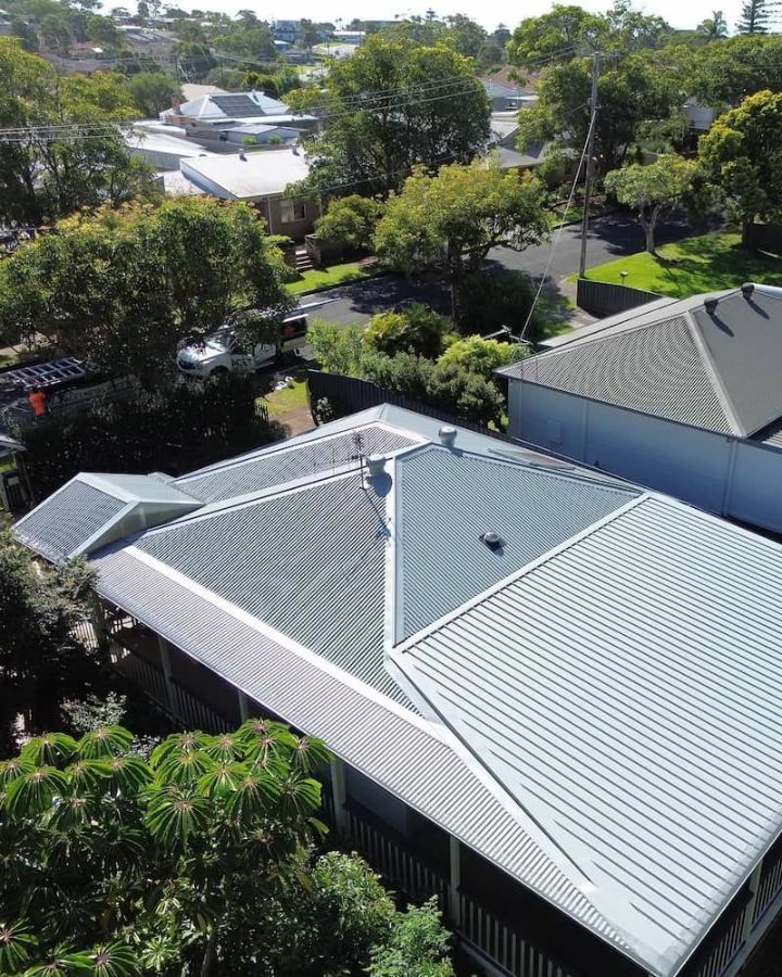 Aerial View of a House With a Light Grey Corrugated Metal Roof — Ace1 Metal Roofing in Taree, NSW