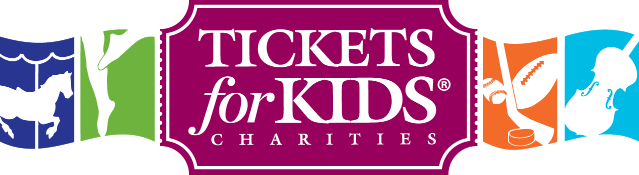 Person wearing headphones, braids, facing three lit computer monitors. Lights and red/blue hues. Person wearing headphones, braids, facing three lit computer monitors. Lights and red/blue hues.