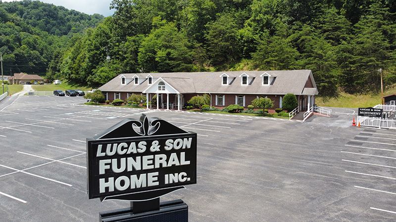 Exterior view of Lucas & Son Funeral Home with  funeral home sign Pikeville, KY