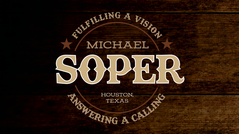 The logo for michael soper is on a wooden background