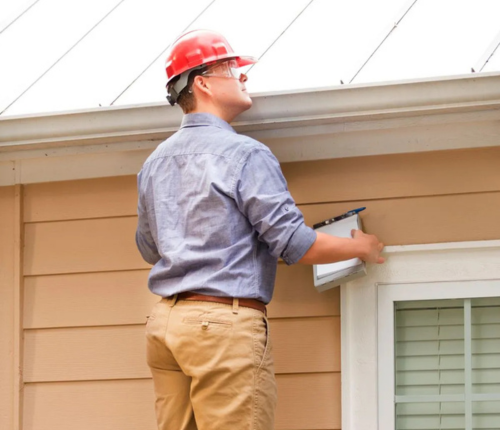 Experienced roofing contractor inspecting a residential roof in Sydney