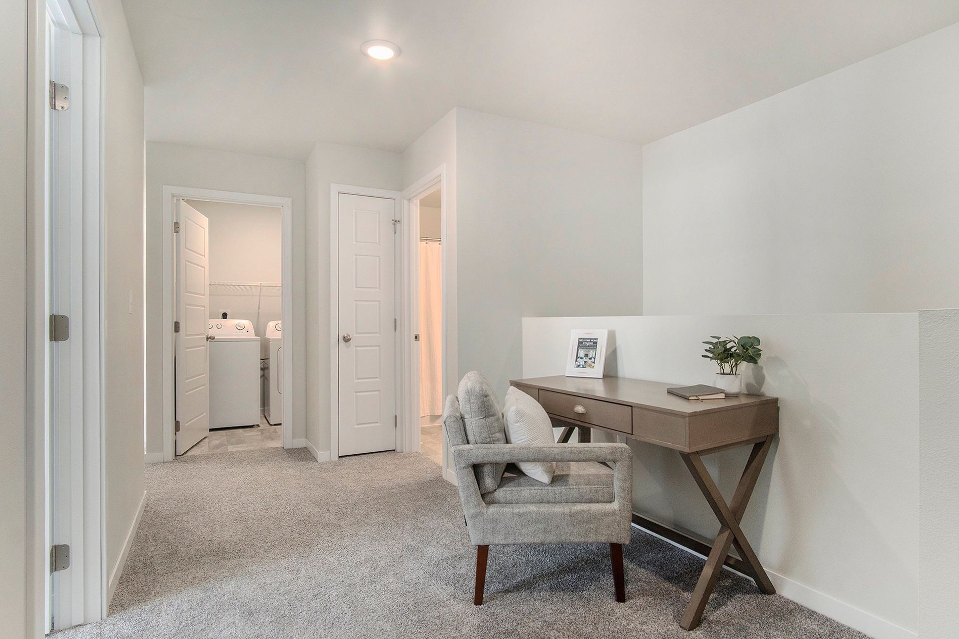 Upstairs loft with a desk.