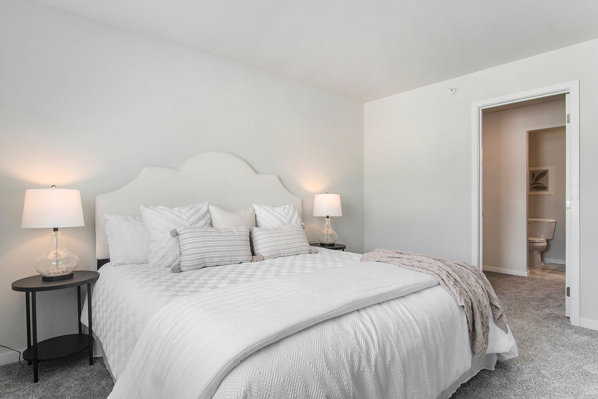 Bedroom looking into walk-in closet.